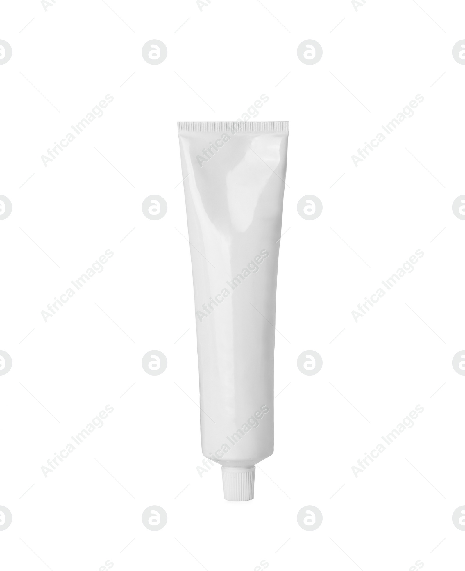 Photo of Blank tube of toothpaste isolated on white