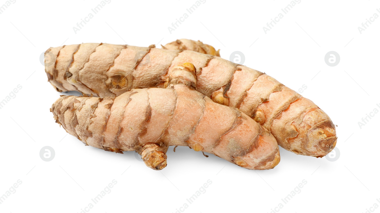 Photo of Fresh whole turmeric roots isolated on white