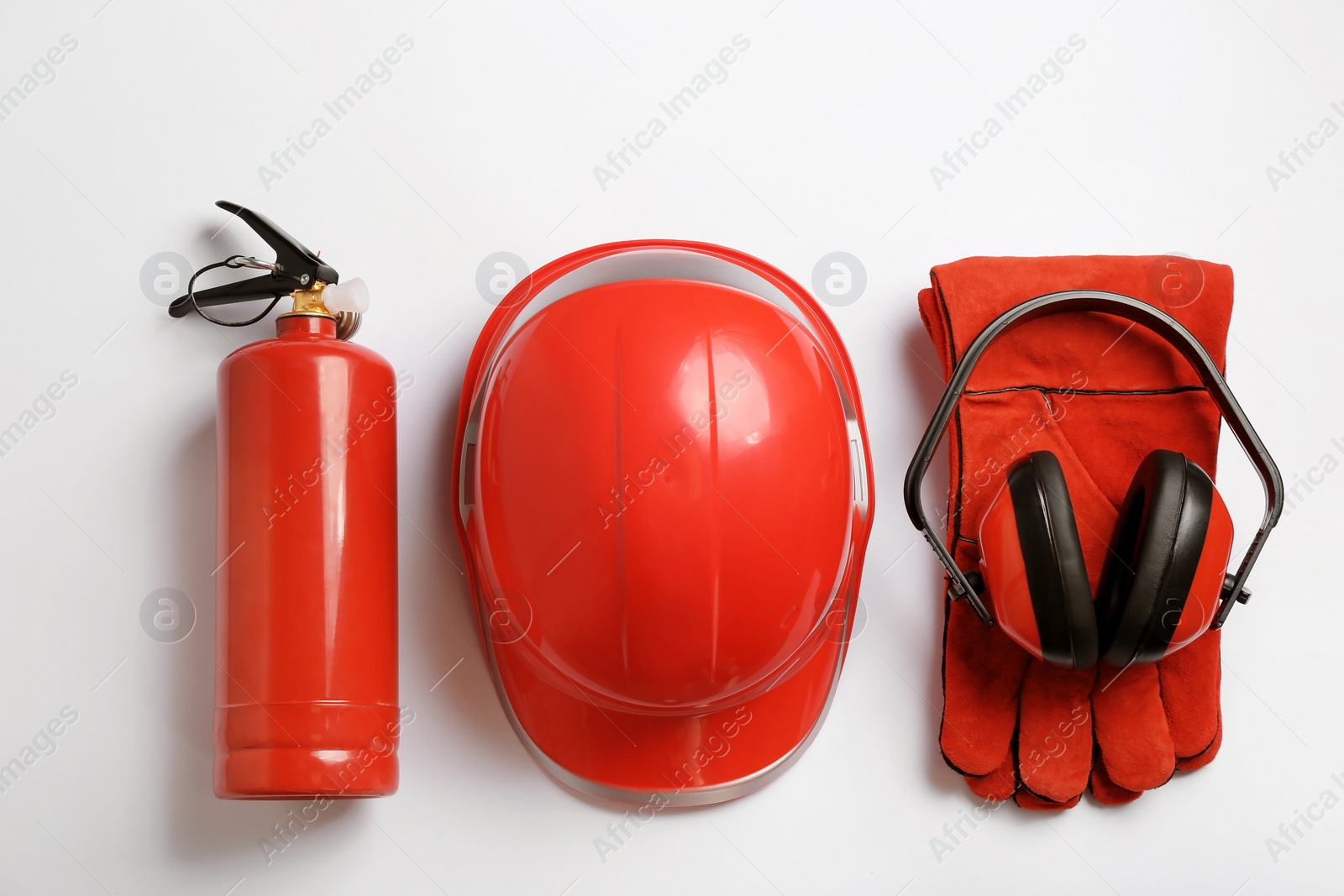 Photo of Flat lay composition with safety equipment on white background