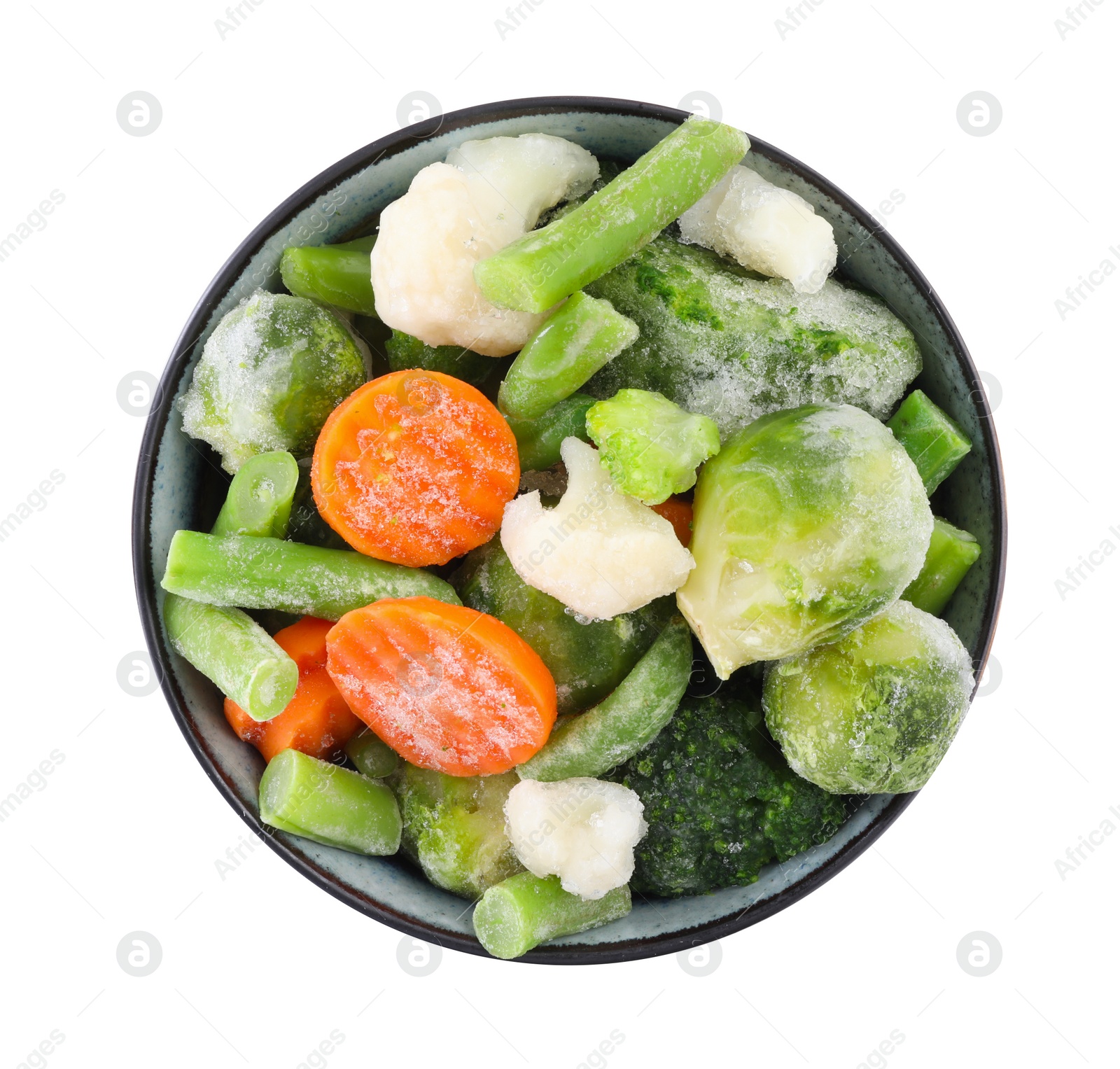 Photo of Mix of different frozen vegetables in bowl isolated on white, top view