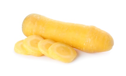 Cut and whole yellow carrots isolated on white