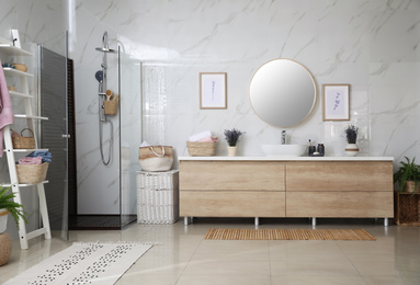 Photo of Bathroom interior with shower stall and counter. Idea for design