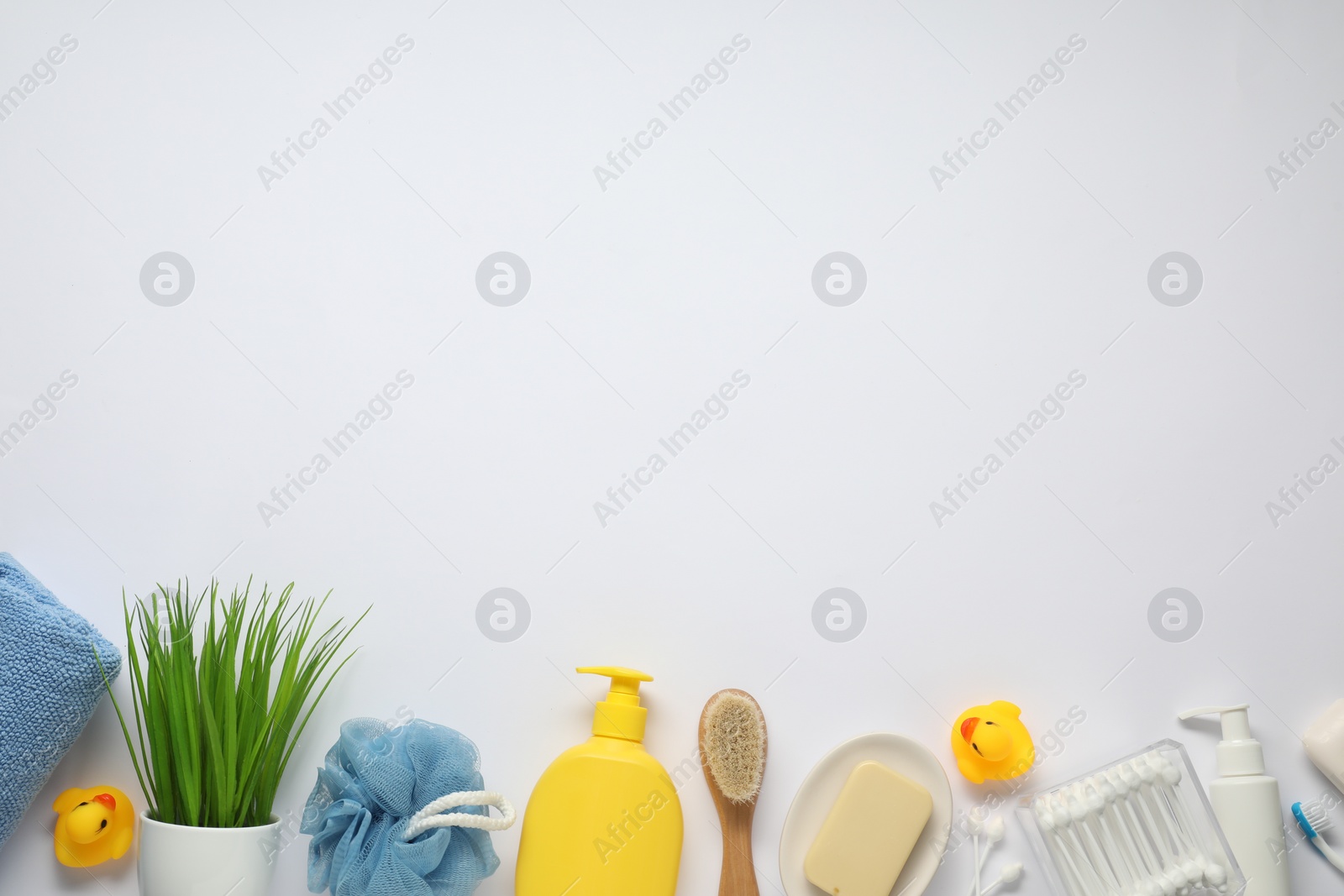 Photo of Baby bath accessories and care products on white background, flat lay. Space for text