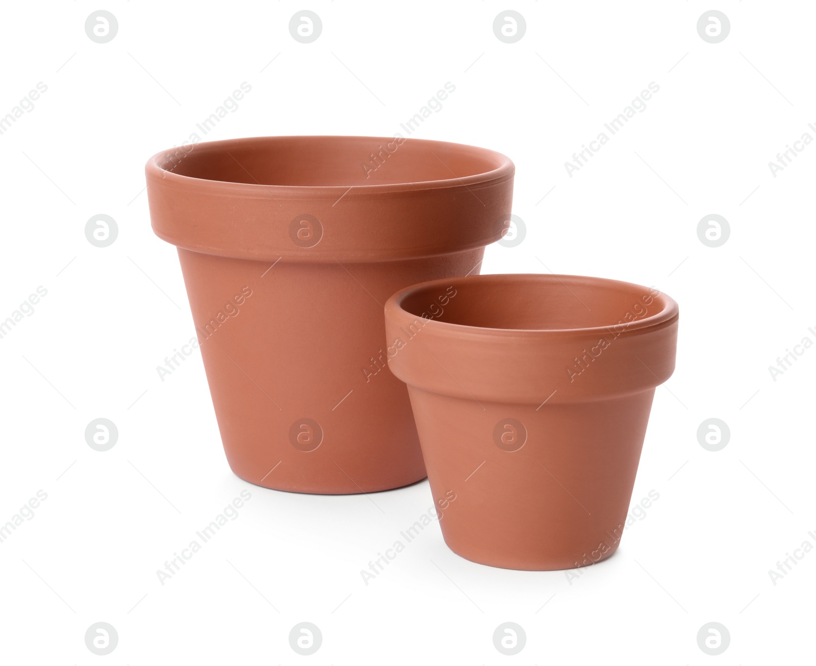 Photo of Stylish terracotta flower pots isolated on white