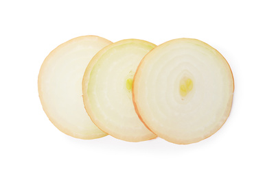 Slices of raw yellow onion on white background, top view