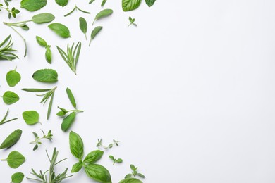 Photo of Many different aromatic herbs on white background, flat lay. Space for text