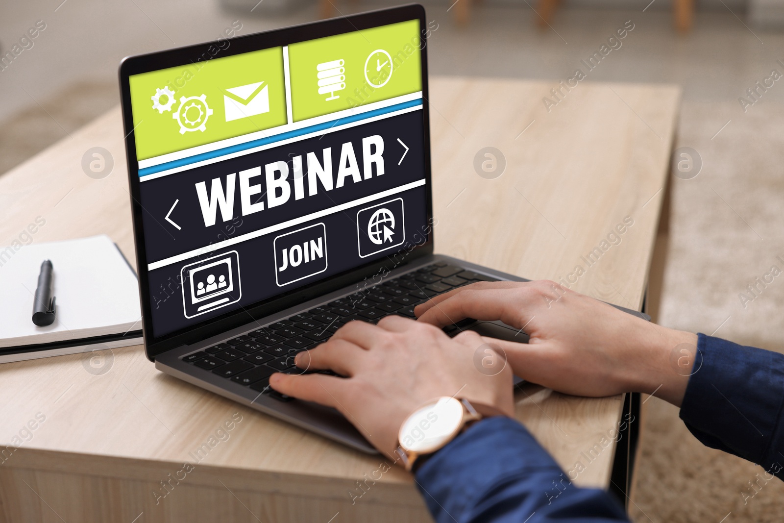 Image of Online webinar, web page on computer screen. Man using laptop at wooden table, closeup