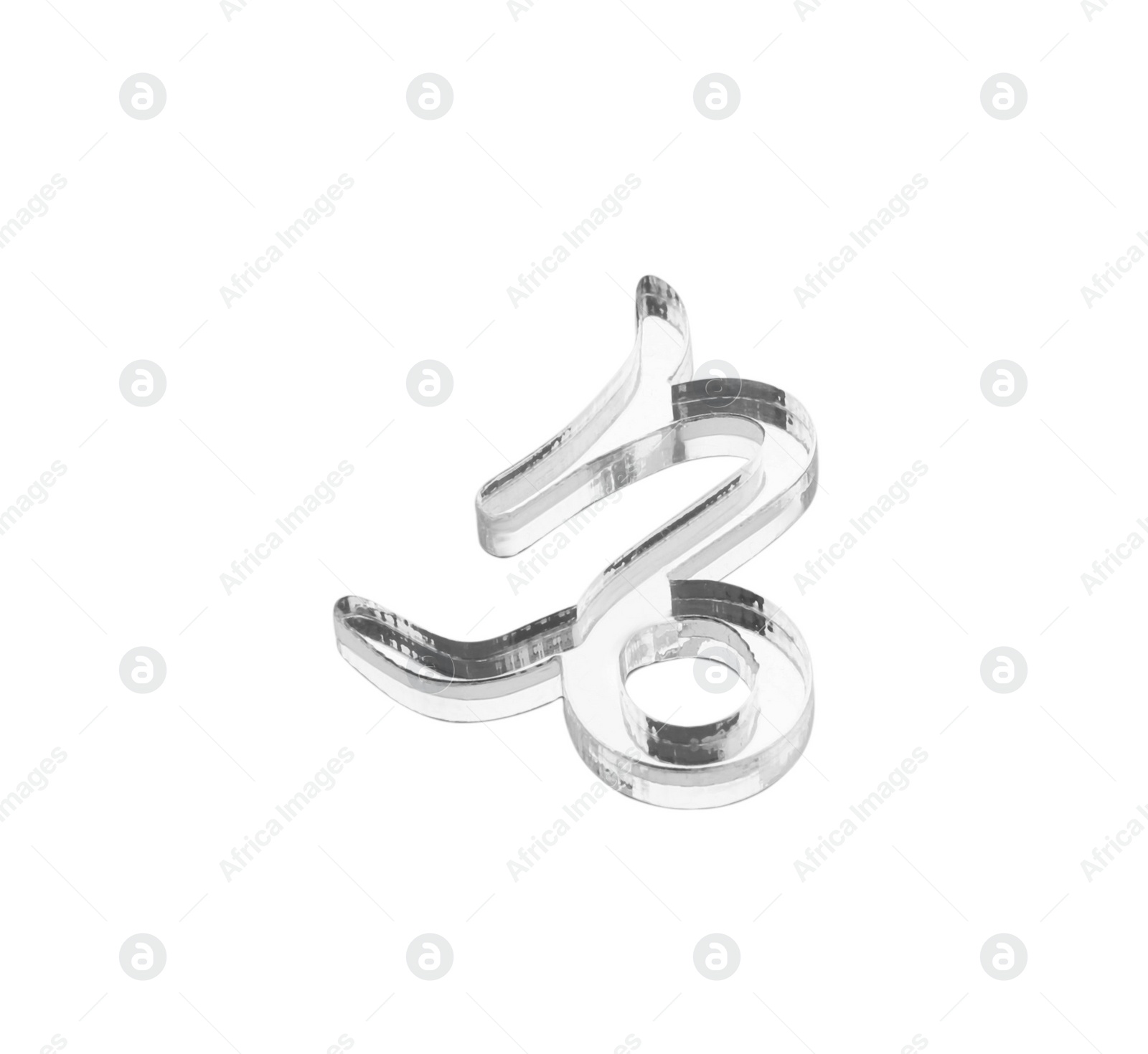 Photo of Zodiac sign. Silver Capricorn symbol isolated on white