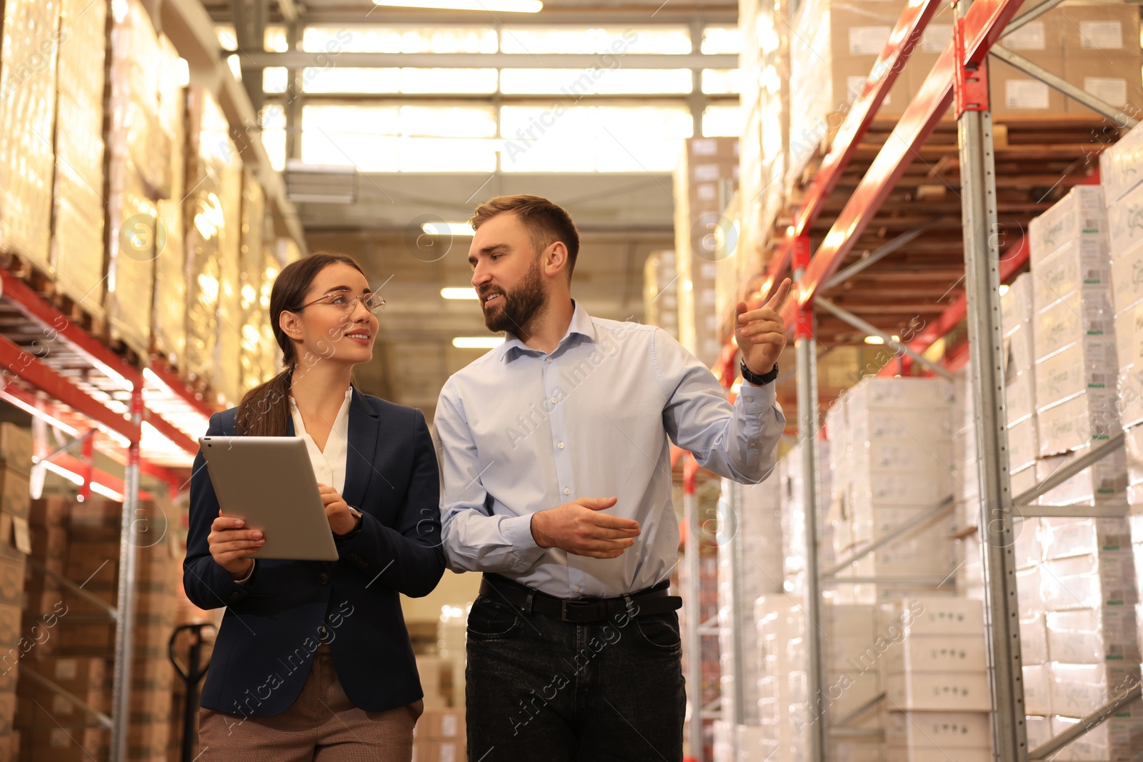 Image of Manager and supervisor at warehouse. Logistics center