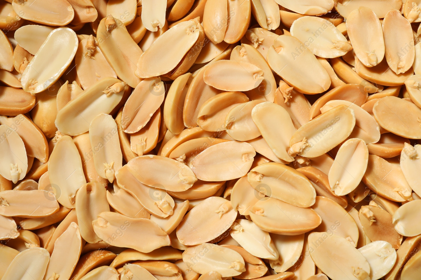 Photo of Fresh peeled peanuts as background, top view