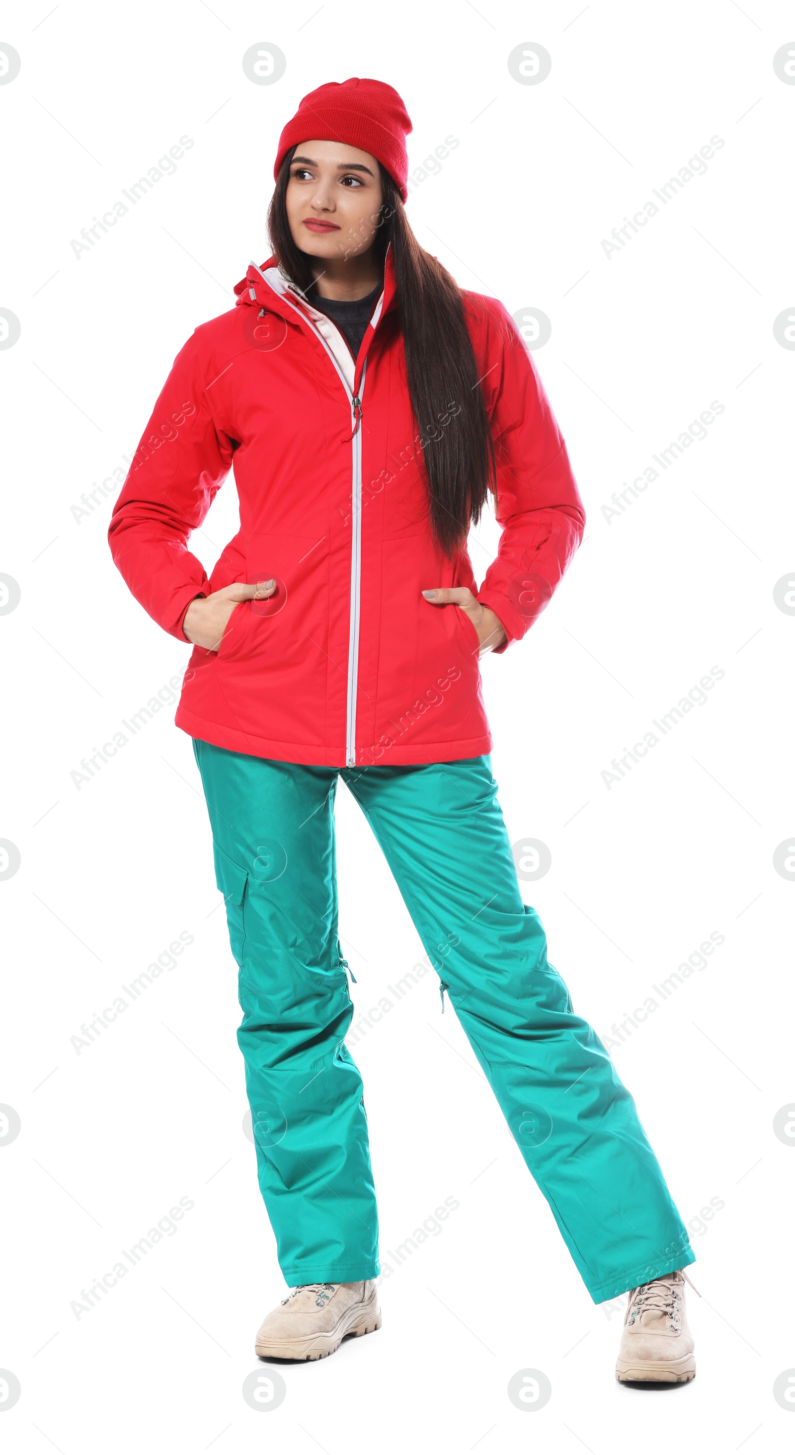 Photo of Woman wearing stylish winter sport clothes on white background