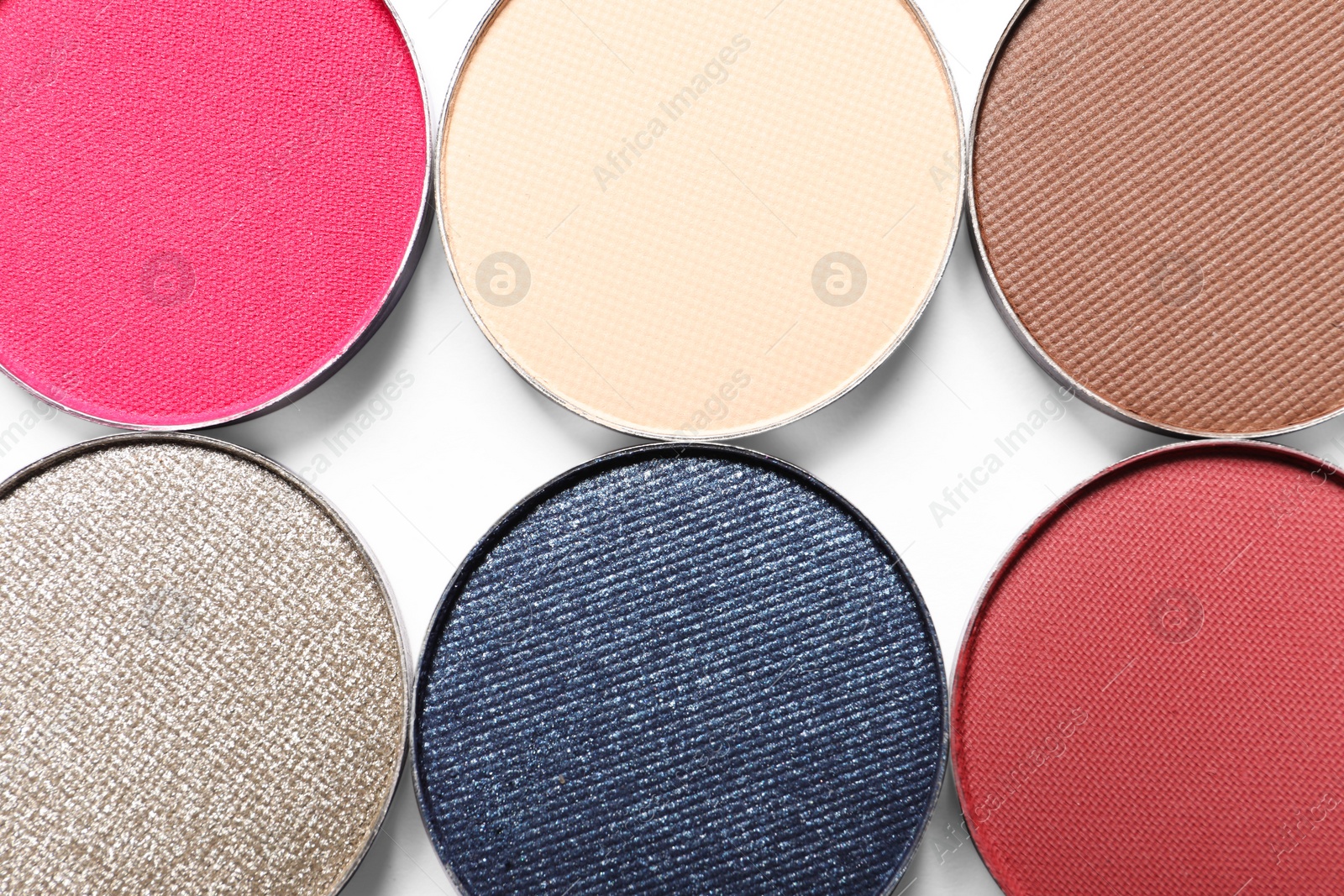 Photo of Different beautiful eye shadows on white background, flat lay