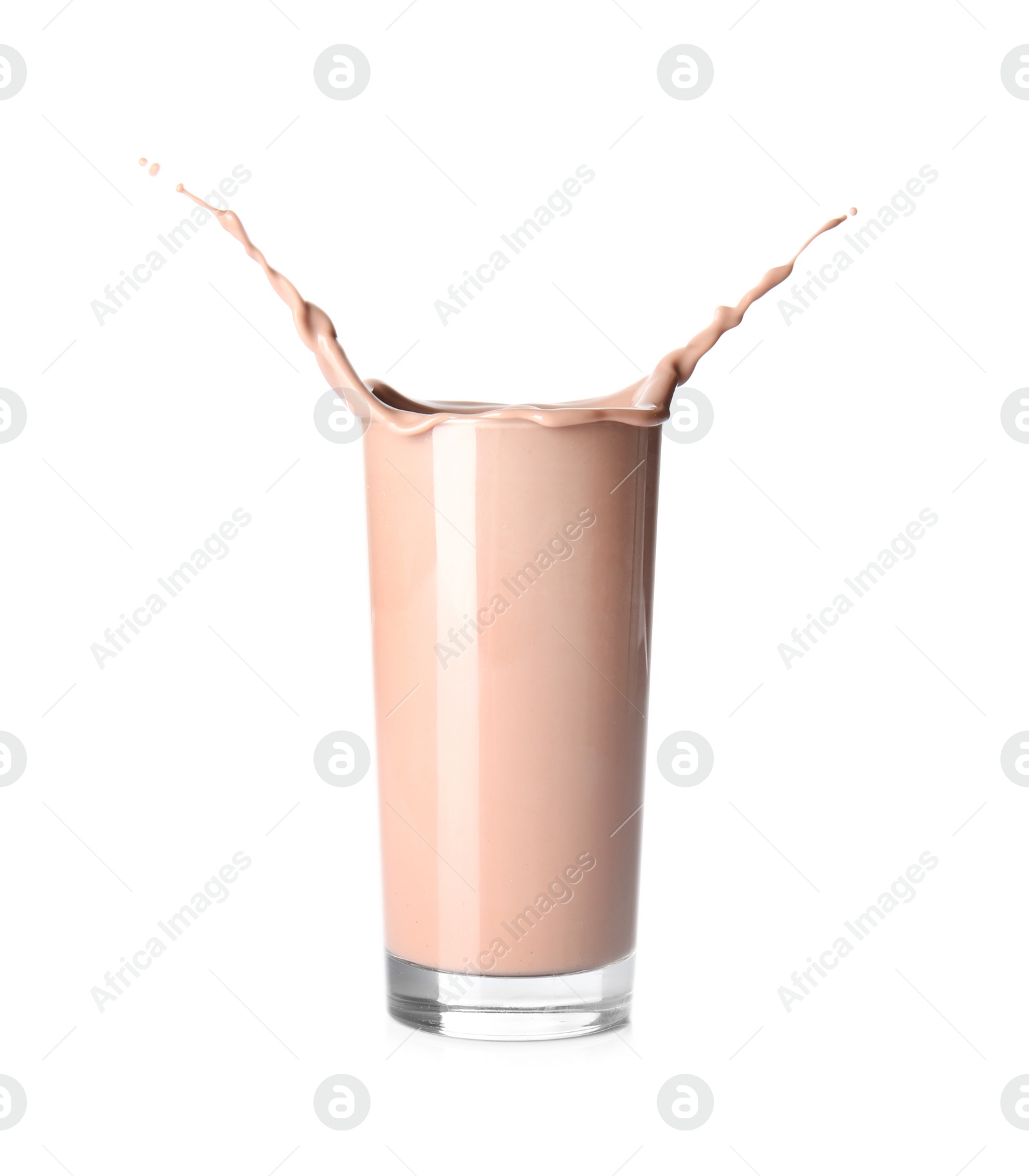 Photo of Glass with splashing chocolate milk on white background. Dairy drink