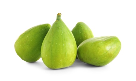 Fresh green figs isolated on white. Tropical fruit