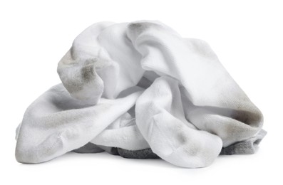 Photo of Different used dirty socks on white background