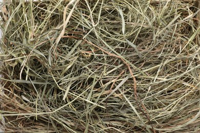 Heap of dried hay as background, top view