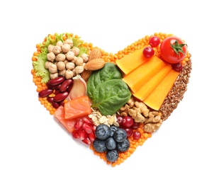 Heart made of healthy products on white background, top view