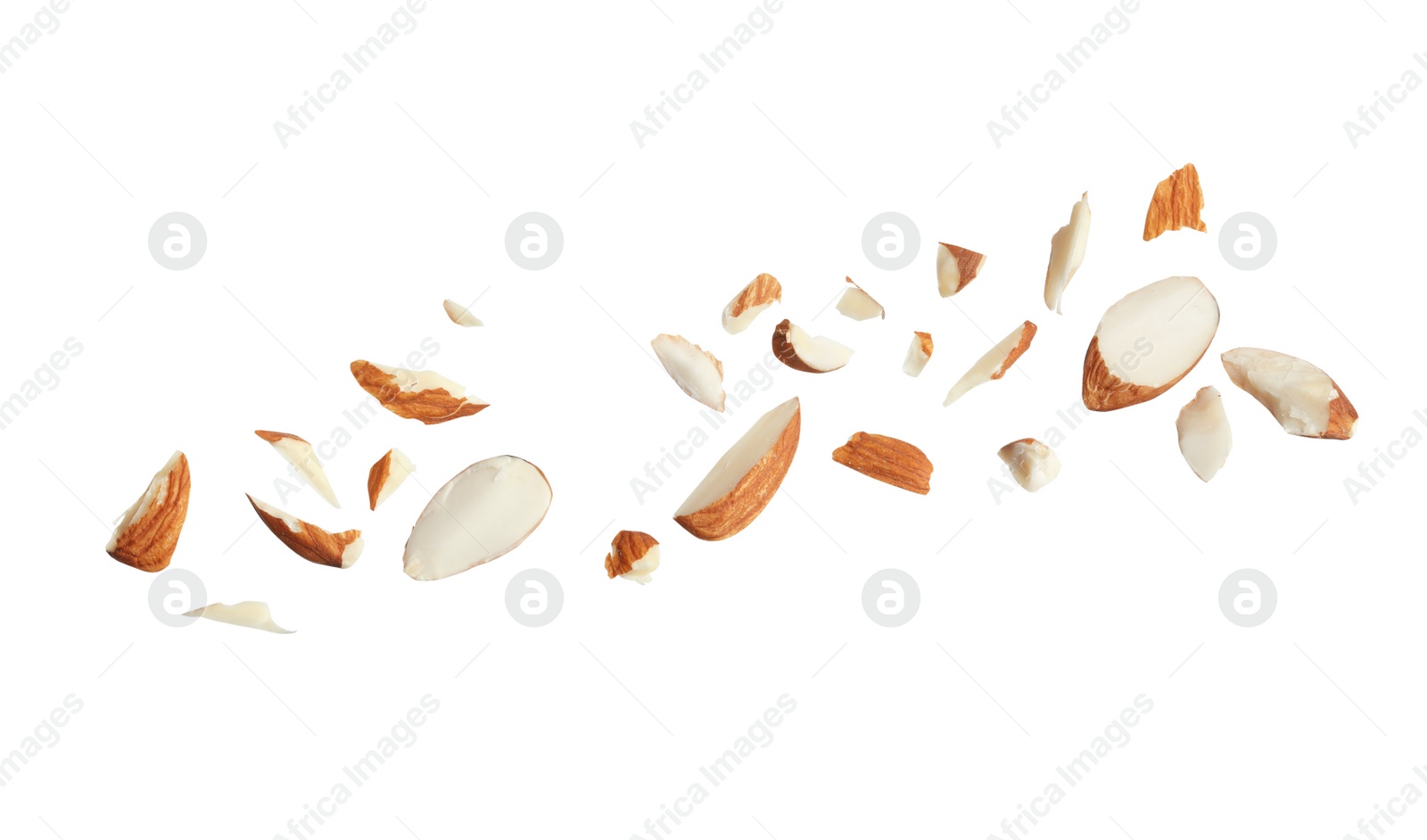 Photo of Pieces of tasty almonds on white background