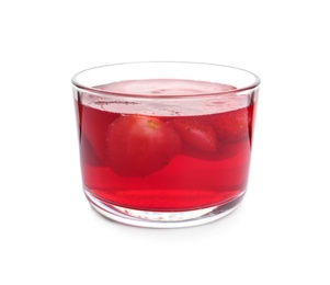 Photo of Tasty jelly dessert with slices of strawberry in glass on white background