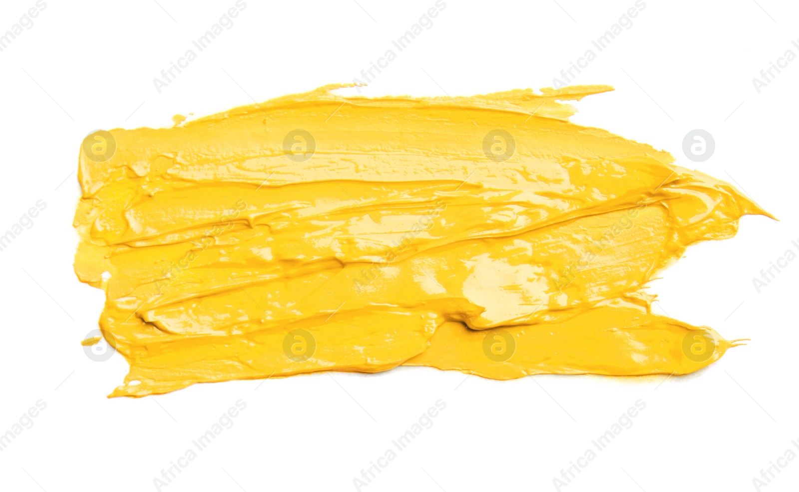 Image of Golden paint stroke on white background, top view