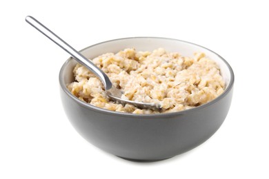 Photo of Ceramic bowl and spoon with oatmeal isolated on white