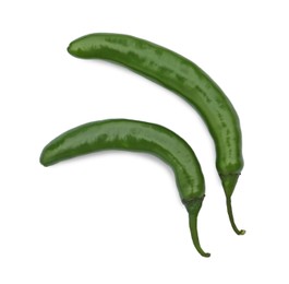 Photo of Green hot chili peppers on white background, top view