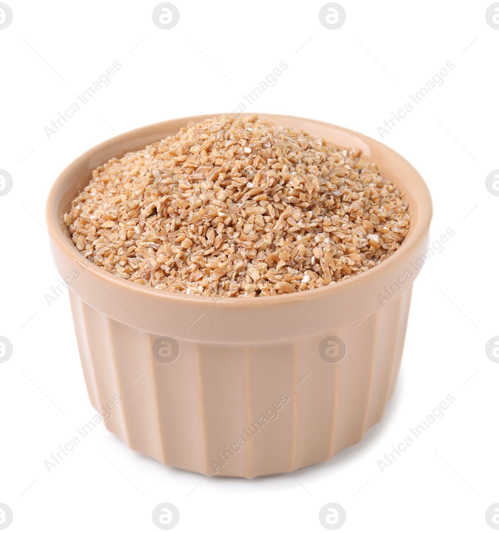 Photo of Dry wheat groats in bowl isolated on white