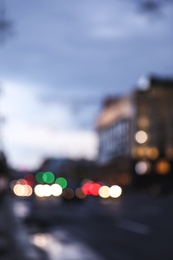 Blurred view of modern city at evening. Bokeh effect