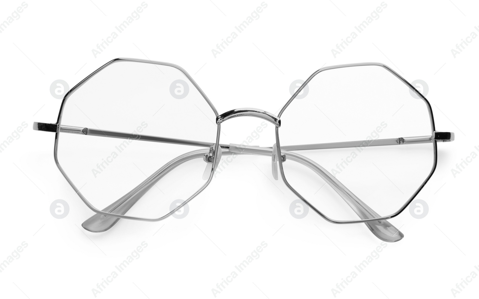 Photo of Stylish glasses with metal frame isolated on white