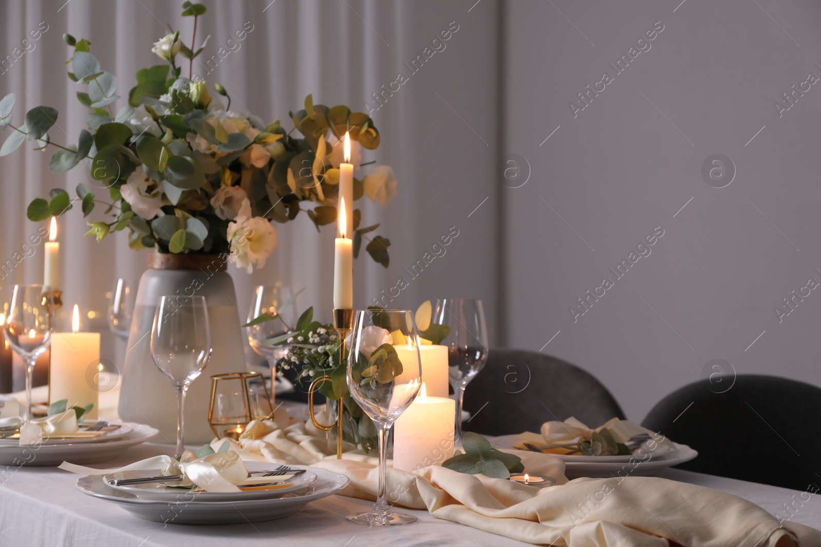 Photo of Festive table setting with beautiful decor indoors