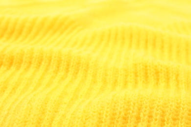 Texture of cozy warm sweater as background, closeup