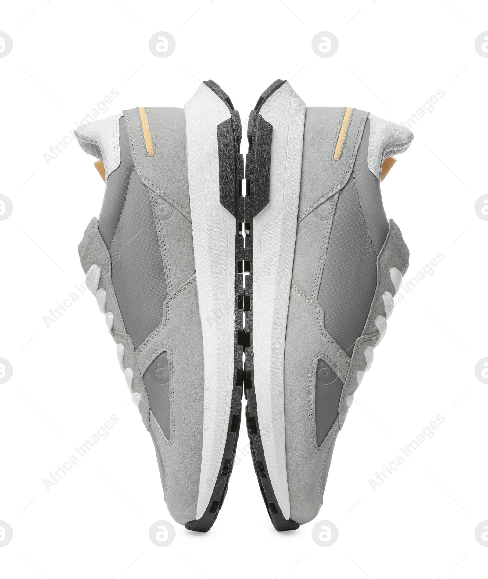 Photo of Pair of stylish grey sneakers isolated on white