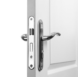 Wooden door with metal handle on white background, closeup
