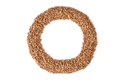 Frame made of uncooked buckwheat on white background, top view