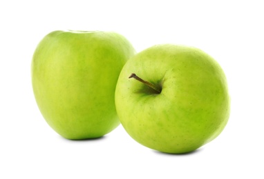 Fresh green apples on white background