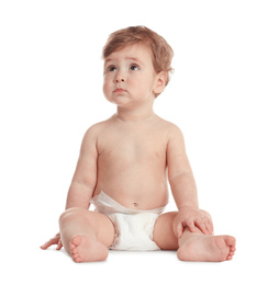 Cute little baby in diaper on white background