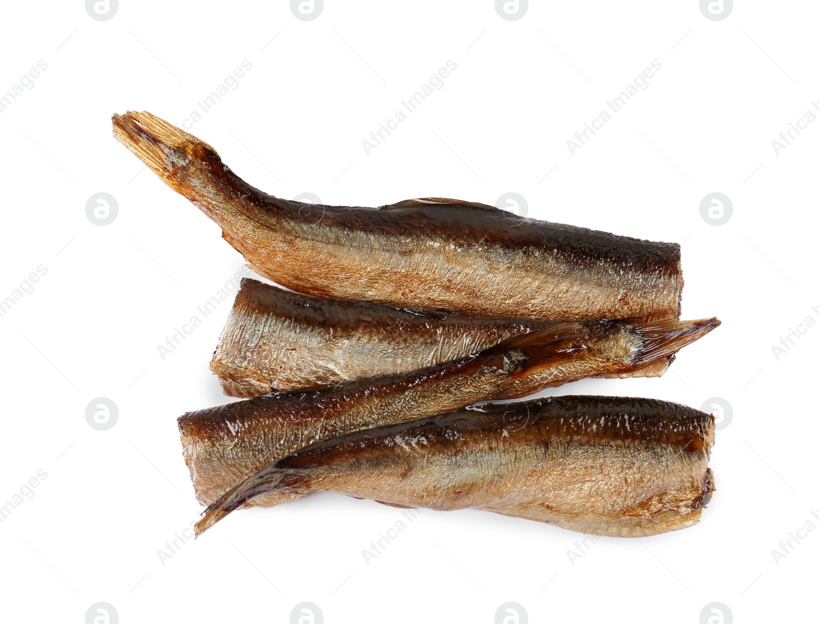 Photo of Tasty canned sprats isolated on white, top view