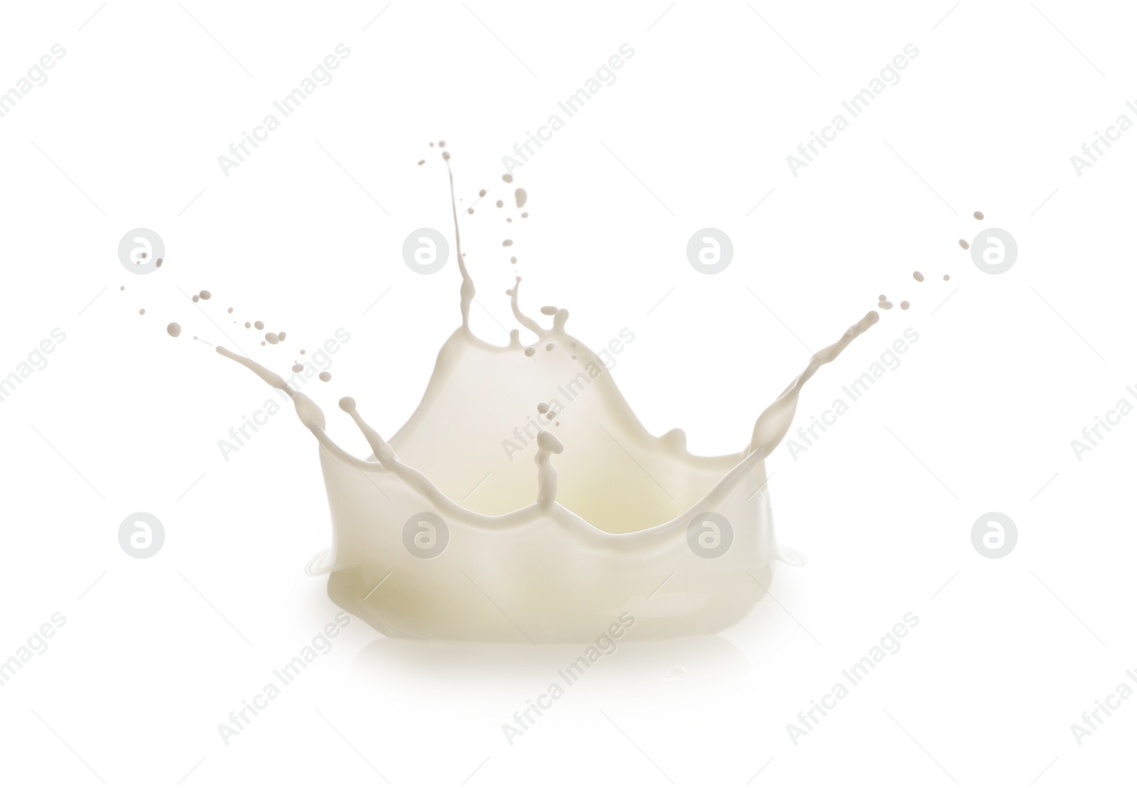 Photo of Splash of fresh milk isolated on white