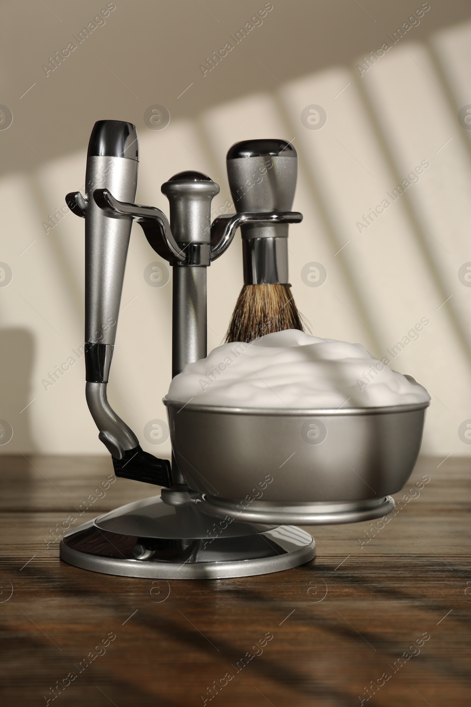 Photo of Set of men's shaving tools on wooden table