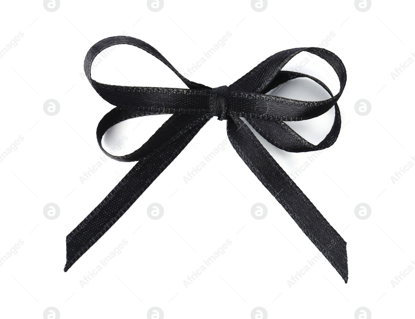 Photo of Black bow on white background, top view. Funeral symbol