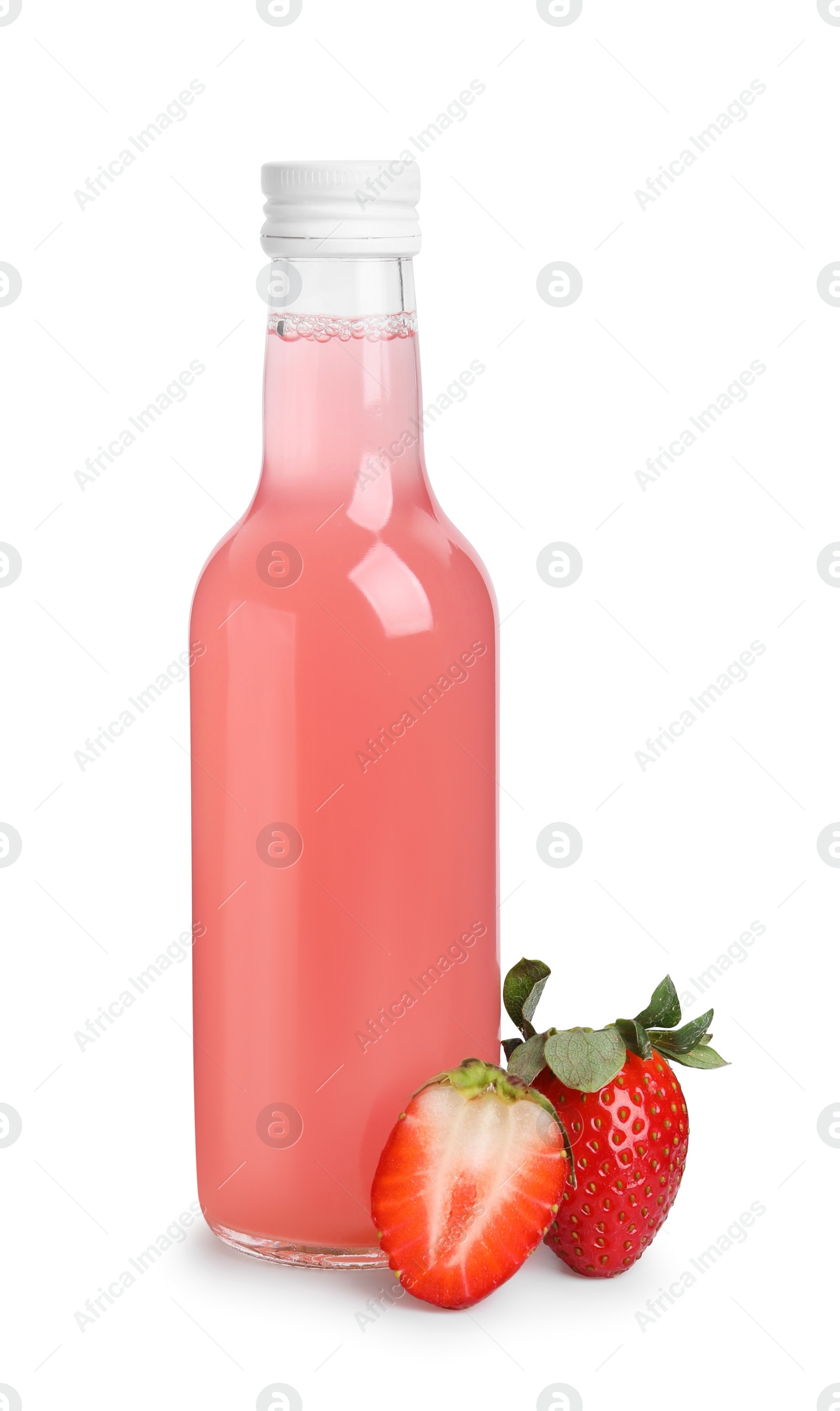 Photo of Delicious kombucha in glass bottle and strawberries isolated on white