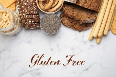 Image of Different gluten free products on white marble table, flat lay