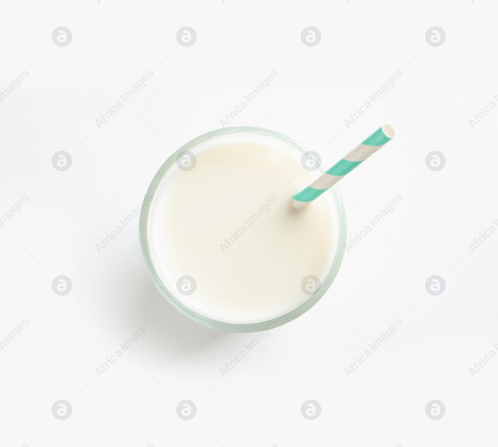 Photo of Glass of milk on white background, top view. Natural food high in protein