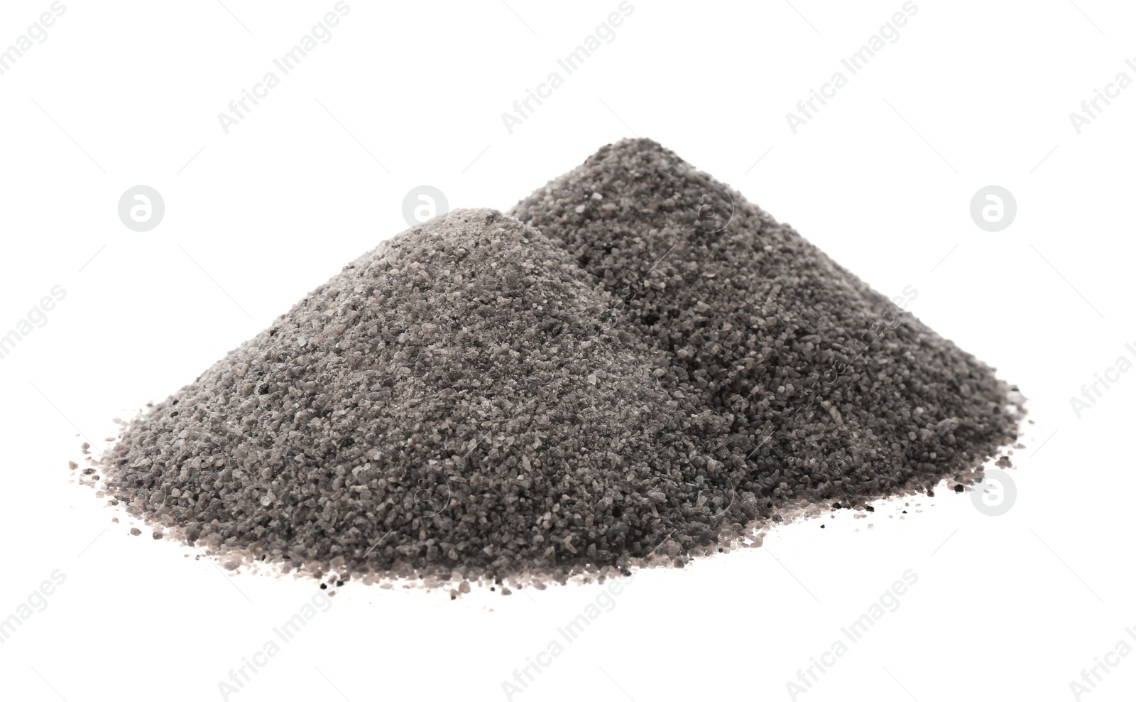 Photo of Piles of ground black salt isolated on white
