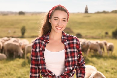 Portrait of smiling woman on animal farm