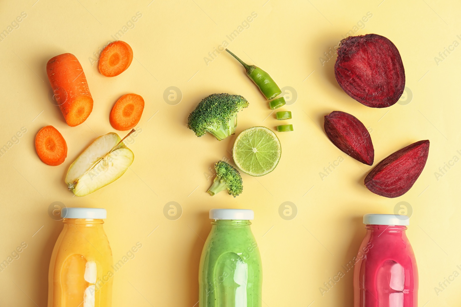 Photo of Flat lay composition with healthy detox smoothies and ingredients on light background