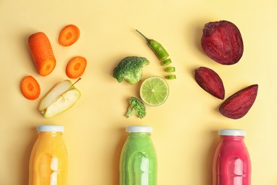 Photo of Flat lay composition with healthy detox smoothies and ingredients on light background