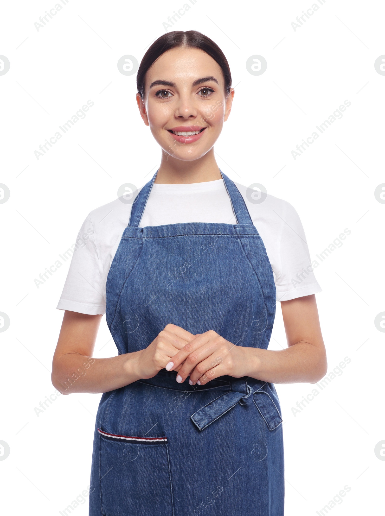 Photo of Young woman in blue jeans apron on white background