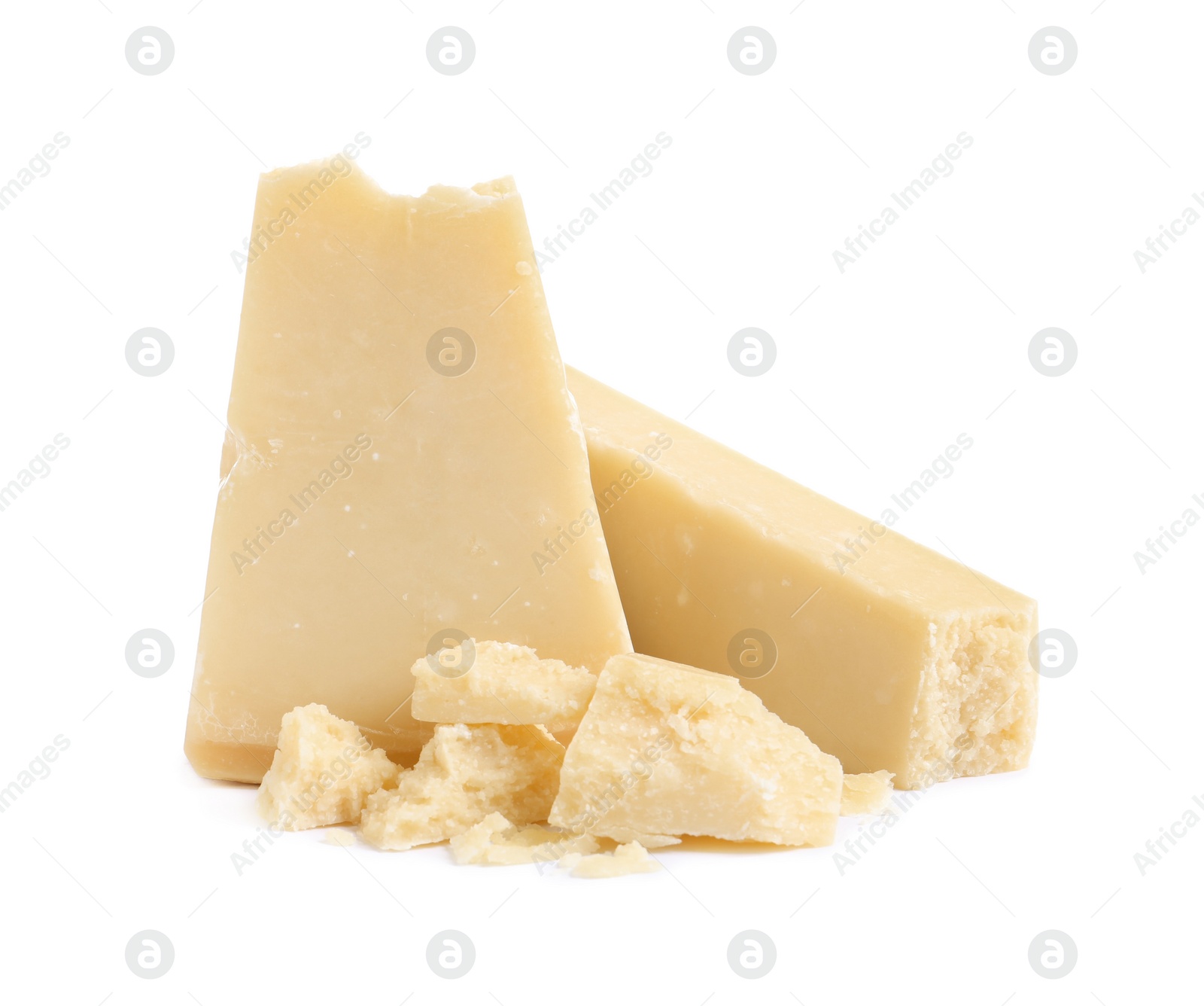 Photo of Pieces of delicious parmesan cheese on white background