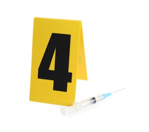 Photo of Syringe and crime scene marker with number four isolated on white